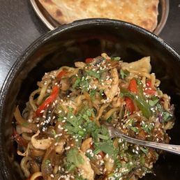 Chicken noodles with fresh plain naan