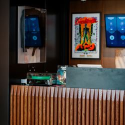 Seven Point - Sales counter with Rock and Roll memorabilia including signed U2 Tour Jacket and Queens Of The Stone Age concert poster with signed tickets