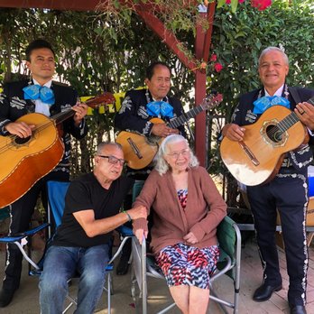 Trio Mariachi Capri - Trio posing with the birthday girl - Musicians Near Me Trio Mariachi Capri - Trio posing with the birthday girl - Musicians Near Me