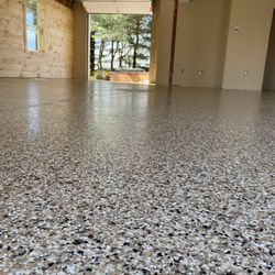 M&J Concrete Coatings - This beautiful two car garage looks great with our Polyaspartic 2-coat high-build color flake system.