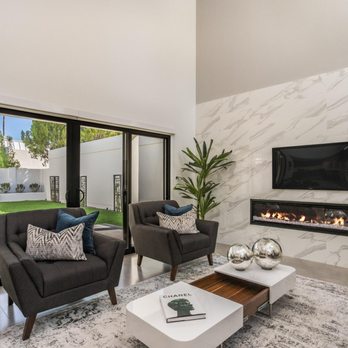 Todd Luckey Construction - living room with fireplace and sliding glass doors - General Contractors Near Me - Phoenix, Arizona Todd Luckey Construction - living room with fireplace and sliding glass doors - General Contractors Near Me - Phoenix, Arizona