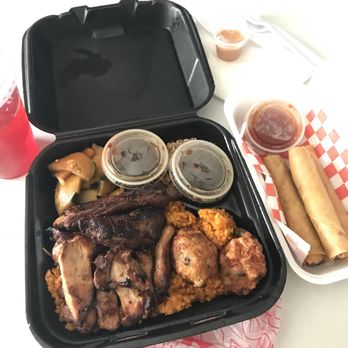 Red Rice - Locals Plate has bbq spare rib and red rice, chicken Caliguen, pickled cucumber, bbq chicken. I got a side of lumpia. - Barbeque Near Me - Las Vegas, Nevada