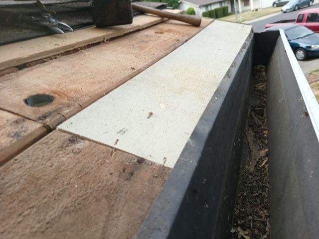 Slide of Quinn Bro's Roofing