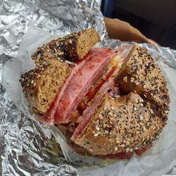 Gems House of Bagels III - Everything pumpernickel bagel with Taylor ham/pork roll and tomato, shredded lettuce