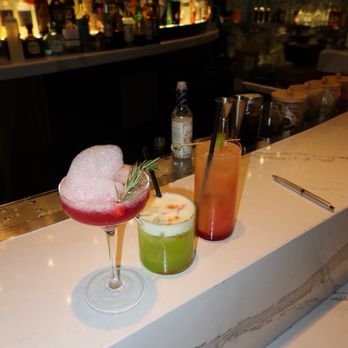 The Chandelier - under the mistletoe, midori sour, and tequila sunrise - Lounges Near Me - Las Vegas, Nevada The Chandelier - under the mistletoe, midori sour, and tequila sunrise - Lounges Near Me - Las Vegas, Nevada