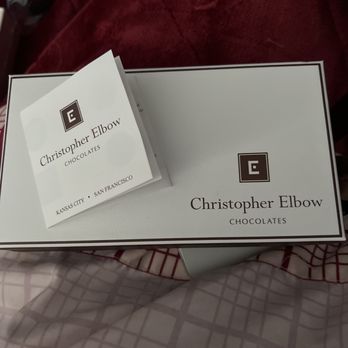 Christopher Elbow Artisanal Chocolates - Lovely box, menu. The box is tied with a brown bow. It's gone because I couldn't wait to eat a chocolate! - Chocolatiers & Shops Near Me - Kansas City, Missouri Christopher Elbow Artisanal Chocolates - Lovely box, menu. The box is tied with a brown bow. It's gone because I couldn't wait to eat a chocolate! - Chocolatiers & Shops Near Me - Kansas City, Missouri