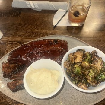 T.J. Stone’s - Two meat smoked special. Ribs, brisket, Brussels sprouts and mashed potatoes. - Bars Near Me - Alexandria, Virginia T.J. Stone’s - Two meat smoked special. Ribs, brisket, Brussels sprouts and mashed potatoes. - Bars Near Me - Alexandria, Virginia