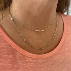 Five Star Jewelry - Restrung pearls and diamonds by the yard necklaces.
