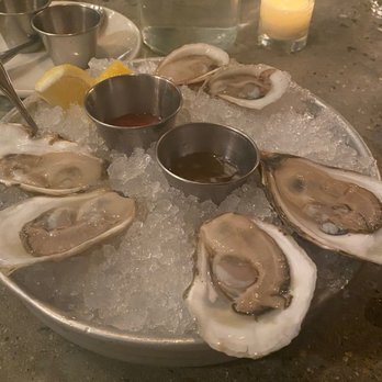 Scales - Oysters float - Seafood Near Me - Portland, Maine Scales - Oysters float - Seafood Near Me - Portland, Maine