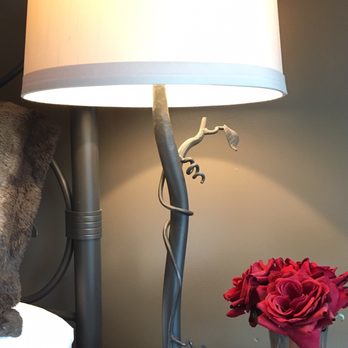 Circle S Ranch & Country Inn - Even the bedside lamp stands in the Claret Room match the theme of wine, with these wrought-iron vines seemingly custom-made for this room. - Bed & Breakfast Near Me - Lawrence, Kansas