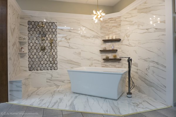 Bathroom Remodel - Large format porcelain tile looks just like marble without the maintenance. Bathroom Remodel - Large format porcelain tile looks just like marble without the maintenance.
