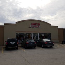 Jay's CD & Hobby - From the parking lot. Plenty of superhero security minding the store front... ;-)