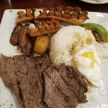Villa De Colombia - Bandeja paisa with rice, avocado, a fried egg, chicharron and sweet plantain - Colombian Near Me - Hackensack, New Jersey Villa De Colombia - Bandeja paisa with rice, avocado, a fried egg, chicharron and sweet plantain - Colombian Near Me - Hackensack, New Jersey