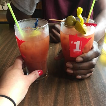 Our Place - two people sitting at a table with drinks - Bars Near Me - Finland, Minnesota Our Place - two people sitting at a table with drinks - Bars Near Me - Finland, Minnesota