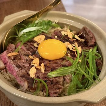 Mahasan - Khao pad man nuer (beef tallow fried rice topped with ribeye and egg yolk) - sooo good - Thai Near Me - San Mateo, California Mahasan - Khao pad man nuer (beef tallow fried rice topped with ribeye and egg yolk) - sooo good - Thai Near Me - San Mateo, California