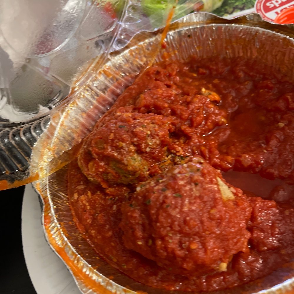 Venice Pizza & Pasta - a close up of a pizza in a foil container - Pizza Near Me - Malvern, Pennsylvania Venice Pizza & Pasta - a close up of a pizza in a foil container - Pizza Near Me - Malvern, Pennsylvania