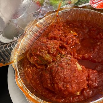 Venice Pizza & Pasta - a close up of a pizza in a foil container - Pizza Near Me - Malvern, Pennsylvania