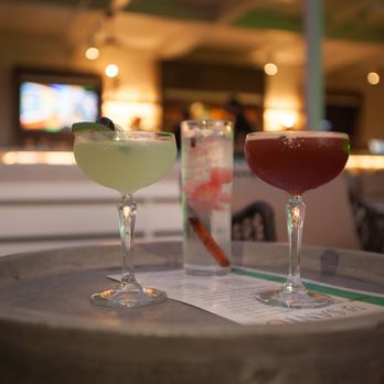 DeSanto - two cocktails on a table in a restaurant - Tapas/Small Plates Near Me - Saint Petersburg, Florida DeSanto - two cocktails on a table in a restaurant - Tapas/Small Plates Near Me - Saint Petersburg, Florida