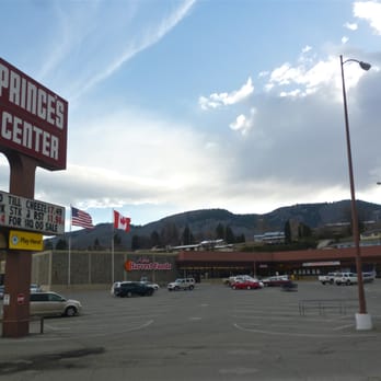 Prince's Center - a parking lot with cars parked in it - Grocery Near Me - Oroville, Washington Prince's Center - a parking lot with cars parked in it - Grocery Near Me - Oroville, Washington