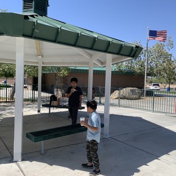 Nevada Trails Park - Nice sitting area between the two playgrounds to sit and watch your kids play. The restroom is conveniently nearby in the background. - Playgrounds Near Me - Las Vegas, Nevada Nevada Trails Park - Nice sitting area between the two playgrounds to sit and watch your kids play. The restroom is conveniently nearby in the background. - Playgrounds Near Me - Las Vegas, Nevada