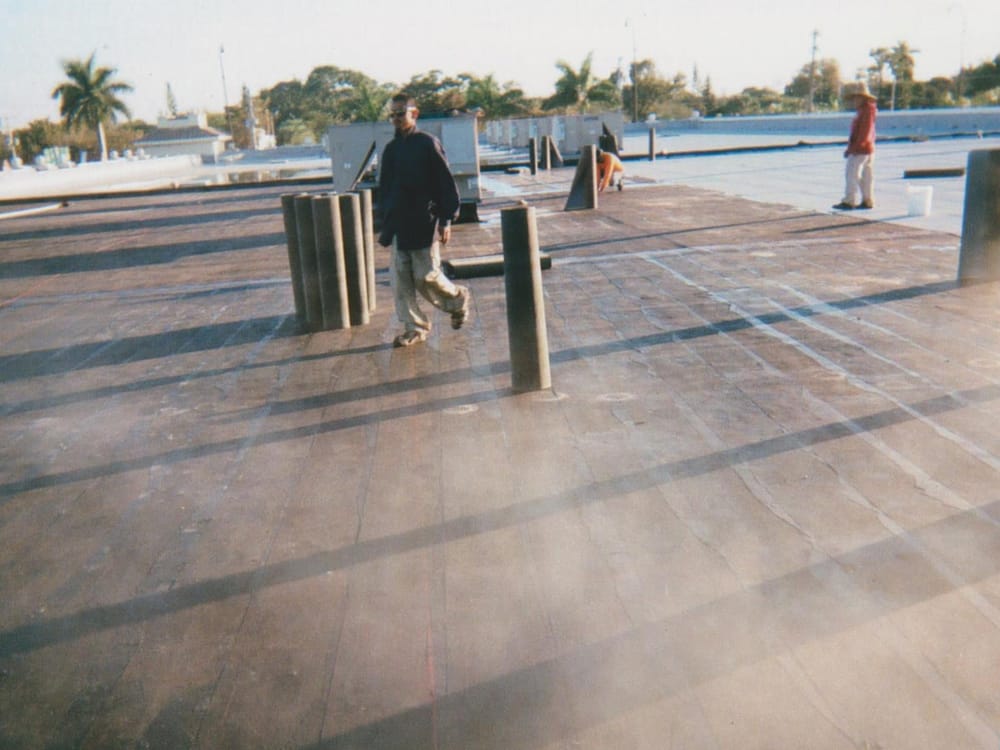 Slide of Top State Roofing & Construction