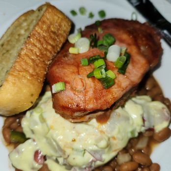 Alhambra Theatre & Dining - Pork sirloin, potato salad, baked beans and garlic bread. Delish! - Performing Arts Near Me - Jacksonville, Florida