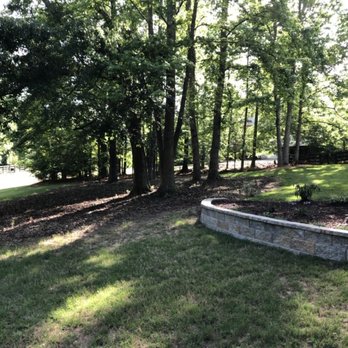 Andrew Hardscape and Landscaping - Wall saving the lawn from erosion - Landscaping Near Me Andrew Hardscape and Landscaping - Wall saving the lawn from erosion - Landscaping Near Me