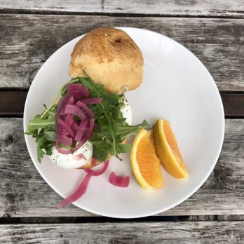 Steadfast Coffee - Poached egg sandwich arugula pickled onion rye mustard cheese- orange wedges - Coffee & Tea Near Me - Nashville, Tennessee Steadfast Coffee - Poached egg sandwich arugula pickled onion rye mustard cheese- orange wedges - Coffee & Tea Near Me - Nashville, Tennessee