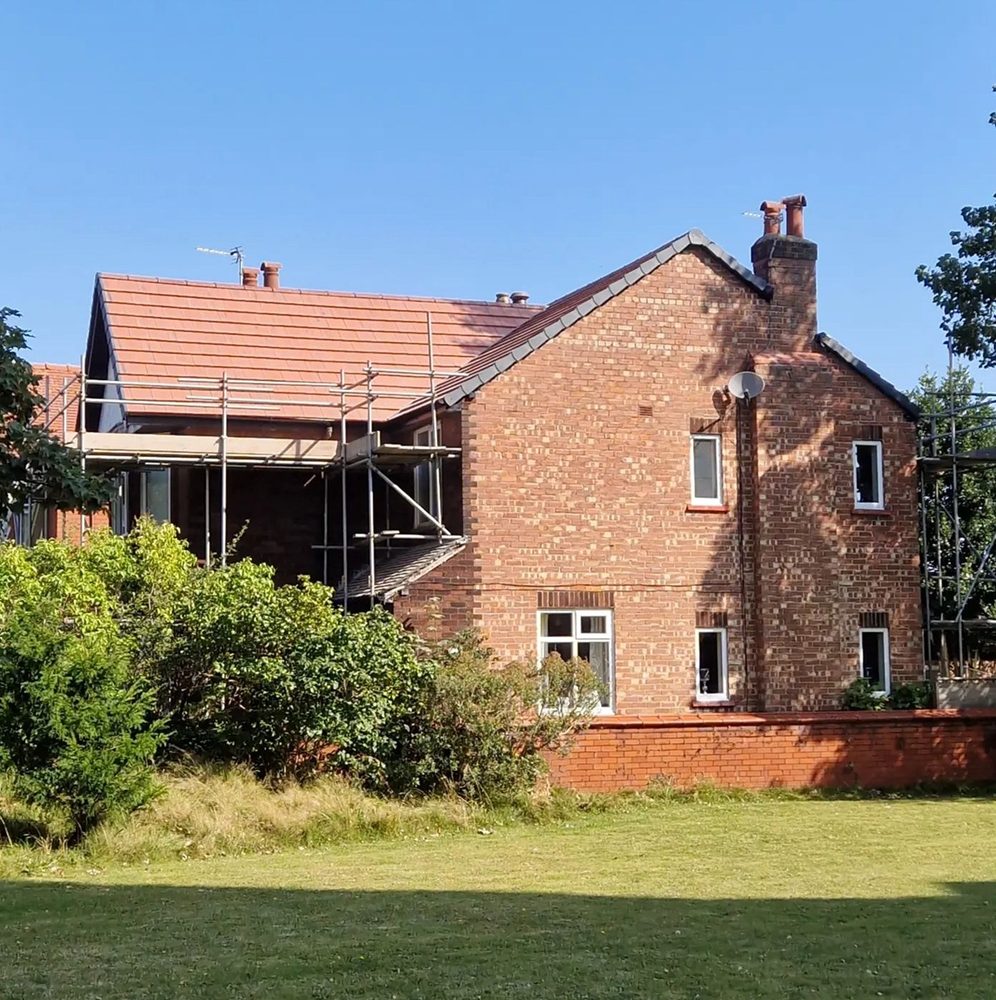 Slide of North Shattuck Roofing