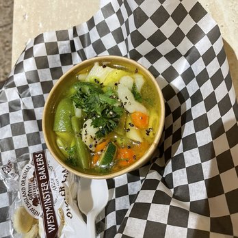 Crostini Sandwiches - a bowl of soup on a checkered napkin - Sandwiches Near Me - Madison, Wisconsin