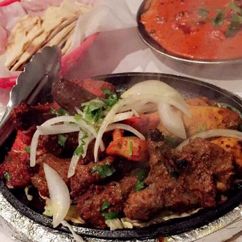India's Restaurant - The mixed tandoor grill, butter chicken, and wheat roti naan. - Indian Near Me - Baton Rouge, Louisiana India's Restaurant - The mixed tandoor grill, butter chicken, and wheat roti naan. - Indian Near Me - Baton Rouge, Louisiana