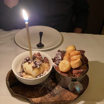 J Carver’s - Hot bananas foster brioche bread pudding with pecan praline gelato - Steakhouses Near Me - Austin, Texas J Carver’s - Hot bananas foster brioche bread pudding with pecan praline gelato - Steakhouses Near Me - Austin, Texas