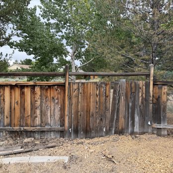 This and That Fence - BEFORE work performed in backyard...literally so weathered and missing slats, rails, posts about to go... - Fences & Gates Near Me