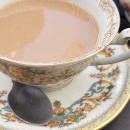 Tea with milk and sugar. Tea with milk and sugar.