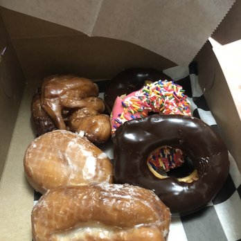 Columbus's Best Donuts - L-R back to front: Apple fritter, double chocolate glaze, raspberry, strawberry sprinkle, Cinnamon Toast Crunch, chocolate glaze - Donuts Near Me - Columbus, Georgia