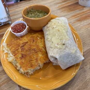 Snow City Cafe - Breakfast Burrito with green chili sauce - Breakfast & Brunch Near Me - Anchorage, Alaska