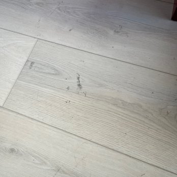 Texas Elite Flooring - Gunk on newly installed floor that we cannot get rid of - Flooring Near Me - Dripping Springs, Texas Texas Elite Flooring - Gunk on newly installed floor that we cannot get rid of - Flooring Near Me - Dripping Springs, Texas