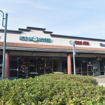 Ice Monster - A small outdoor patio setup right at the front of the shop with simple wooden tables and chairs -- made for easy, relaxed summer moments. - Juice Bars & Smoothies Near Me - Walnut Creek, California