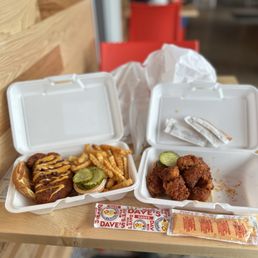 On the left cauli slider with fries (combo) and Dave's bites(chicken bites)