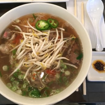 Super Pho - Pho with their sate sauce. Can't really taste the date sauce much. - Vietnamese Near Me - Herndon, Virginia Super Pho - Pho with their sate sauce. Can't really taste the date sauce much. - Vietnamese Near Me - Herndon, Virginia