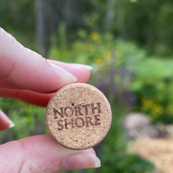 North Shore Winery - a hand holding a wine cork - Wineries Near Me - Lutsen, Minnesota