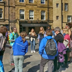 Potter Tour - The Grassmarket, chatting about how Nearly Headless Nick lost his head.  Mostly.