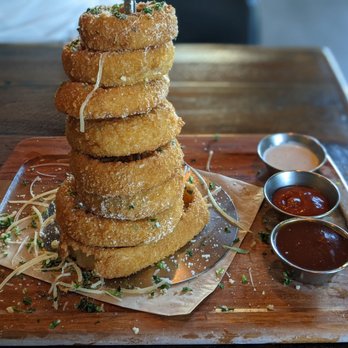 Finneys Crafthouse - Porter Ranch - Onion Ring Tower with BBQ sauce, ketchup, and ranch - New American Near Me - Porter Ranch, California Finneys Crafthouse - Porter Ranch - Onion Ring Tower with BBQ sauce, ketchup, and ranch - New American Near Me - Porter Ranch, California