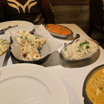 Maharaja - Garlic and garlic cheese naan bread, lamb tikki masala and butter chicken. - Indian Near Me - St. George, Utah Maharaja - Garlic and garlic cheese naan bread, lamb tikki masala and butter chicken. - Indian Near Me - St. George, Utah