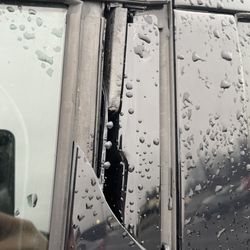 Joe May's Towing And Repair - side of my door that the worker broke