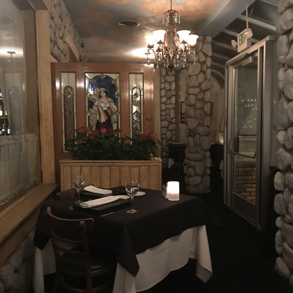 Castelli's - Our intimate table for two, located up front. - Italian Near Me - Palm Desert, California