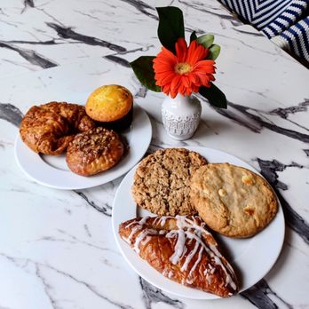 Cafe de Fleur - Butter croissant, lemon poppy seed muffin, sticky bun, oatmeal raisin cookie, white chocolate macadamia nut cookie, and an apple claw - Coffee & Tea Near Me - Summerville, South Carolina
