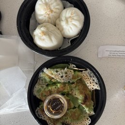 Top: eggplant bao Bottom: seafood gyoza Top: eggplant bao Bottom: seafood gyoza