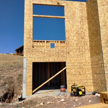 TMJ Construction Services - a house under construction - General Contractors Near Me