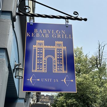 Babylon Kebab Grill - a blue sign hanging from the side of a building - Middle Eastern Near Me - Lancaster, Pennsylvania